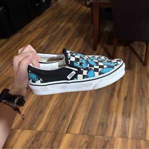 Vans Black and White Checkerboard Slip-Ons with Blue Accents